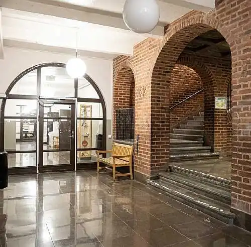 Fire rated steel entry door with arched top light and arched side lights EI2 60, RC4